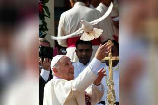 Pope Francis releases a dove at the Sanctuary of Our Lady of the Rosary in Madhu, Sri Lanka, Jan. 14.