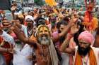 Hindu holy men shout slogans and block a road during a protest against alleged violence against Hindus in Jammu, India, July 19. Leaders of the Pontifical Council for Interreligious Dialogue said Hindus and Christians must work for a &quot;culture of inclusio n for a just and peaceful society.&quot;