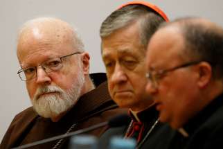 Boston Cardinal Sean P. O&#039;Malley, president of the Pontifical Commission for the Protection of Minors, Cardinal Blase J. Cupich of Chicago and Archbishop Charles Scicluna of Malta attend a media briefing Feb. 22, 2019, the second day of the Vatican meeting on the protection of minors in the church. 