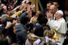 Pope Francis greets people as he arrives for his general audience in Paul VI hall at the Vatican Jan. 22, 2020.