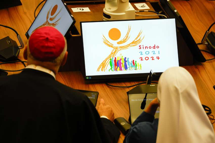 Participants in the assembly of the Synod of Bishops gather in the Paul VI Audience Hall at the Vatican before the first working session of the assembly of the Synod of Bishops October 4, 2023.