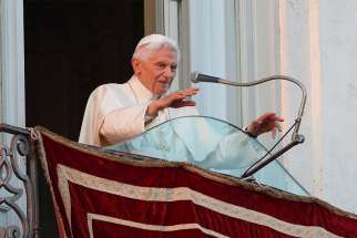 Pope Benedict XVI greets the crowd during his final public appearance as pope at Castel Gandolfo, Italy, Feb. 28, 2013.