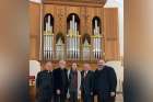 Fr. Jean-Pierre Couturier, left, was instrumental in saving this pipe organ and helping find it a new home at Montreal’s Sainte-Catherine-de-Sienne Parish. He is joined at its unveiling by technician Karl Raudsepp, Geneviève Soly, Karl Wilhelm, who built the organ, and Aldéo Jean, organist at its previous home, Très-Saint-Rédempteur.