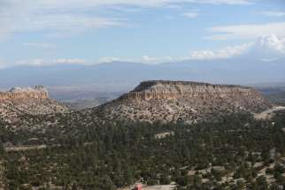 Rock formations and mountains are pictured near Los Alamos, N.M., Nov. 21, 2020.