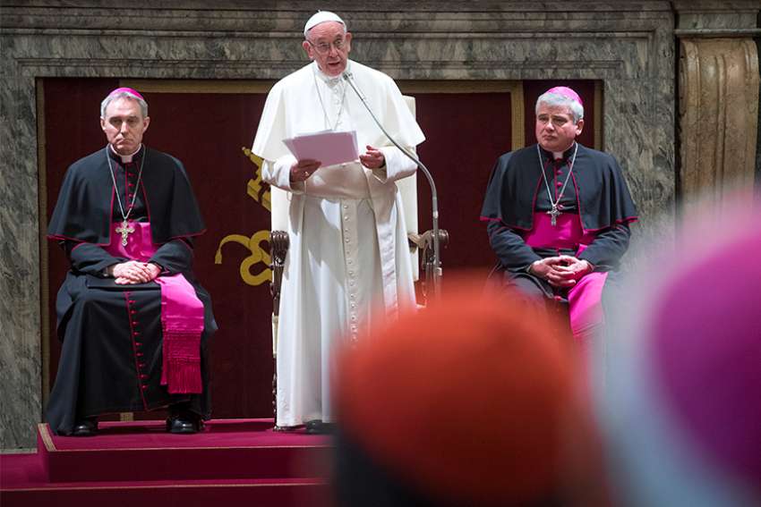  Pope Francis speaks with top officials of the Roman Curia and Vatican City State and with cardinals living in Rome in the Clementine Hall Dec. 2017.