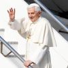 Pope Benedict XVI waves as he boards his plane to leave for a six-day pastoral visit to Mexico and Cuba at Fiumicino airport in Rome March 23.