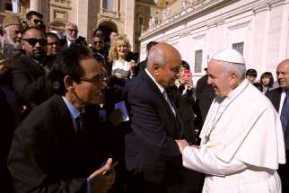 The Pope greets Mobeen Khaja and his delegation from the Association of Progressive Muslims of Canada, including several Catholics, in St. Peter’s Square Oct. 24. 
