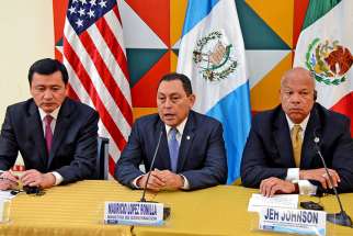 A handout picture provided by the Guatemalan Foreign Relations Ministry shows Mexican Interior Secretary Miguel Angel Chong, Guatemalan Interior Minister Mauricio Lopez Bonilla, and U.S. Secretary of Homeland Security Jeh Johnson addressing the humanitar ian crisis of child migrants at the U.S. border during a press conference at the Foreign Minister&#039;s office in Guatemala City July 9. President Obama has asked Congress for $3.7 billion dollars in aid to plug the flood of young parentless migrants.
