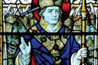 A stained glass window of St. Thomas Becket is seen at St. Alban’s Cathedral in St. Albans, England.