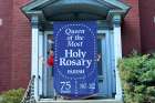 A 75th anniversary banner hangs from Ottawa’s Queen of the Most Holy Rosary Church.