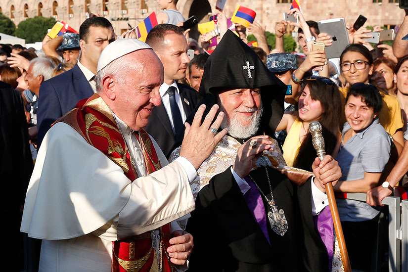 Pope Francis and Catholicos Karekin II, patriarch of the Armenian Apostolic Church, arrive for an ecumenical meeting and prayer for peace in Republic Square in Yerevan, Armenia, June 25.