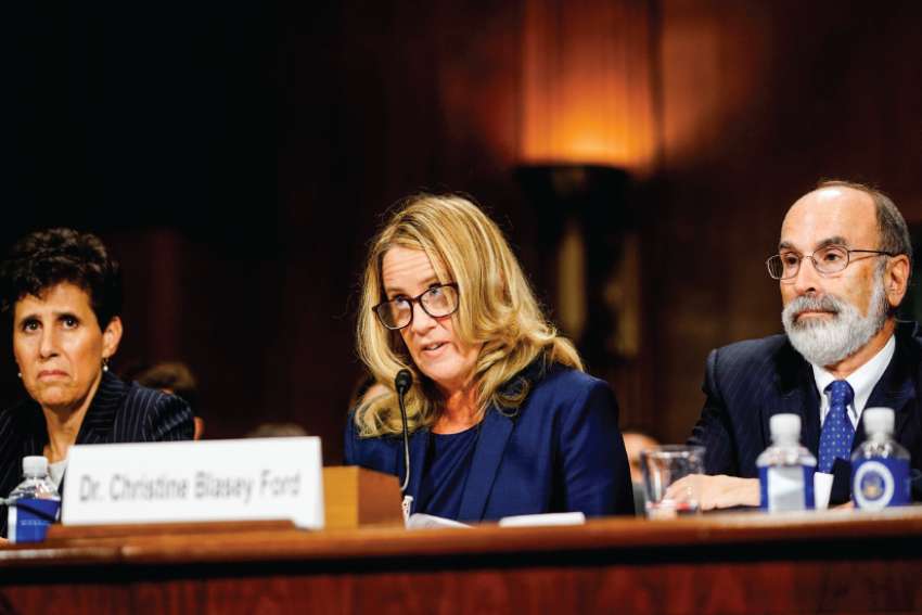 Christine Blasey Ford, with lawyer Debra S. Katz, left, answers questions at a Senate Judiciary Committee hearing in Washington. Ford testified about an accusation that Supreme Court nominee Judge Brett Kavanaugh sexually assaulted her in 1982. 
