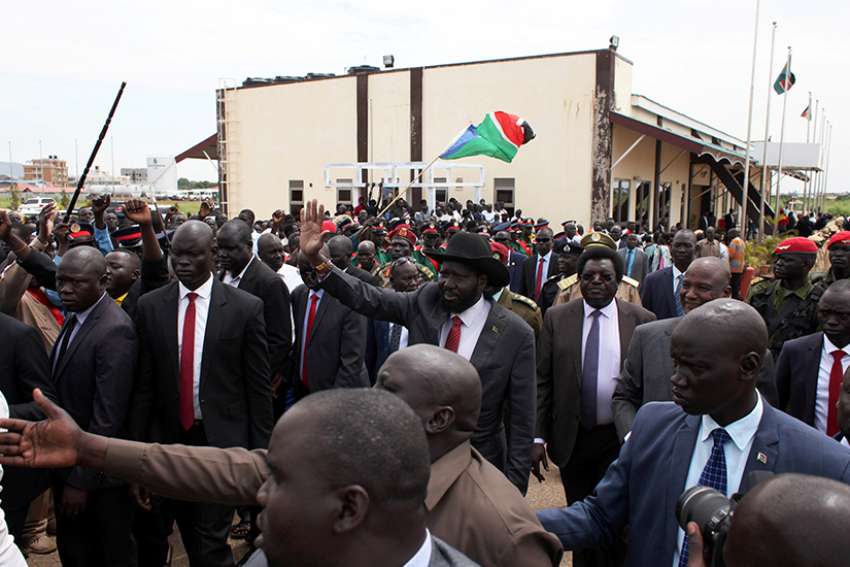 South Sudan President Salva Kiir is welcomed by supporters on his return from peace talks in Kampala July 9 at the Juba Airport. As South Sudanese peace negotiations tackled the last outstanding issues, church leaders called for genuine dialogue, healing and trust building, so that politicians have the will to implement a peace pact. 