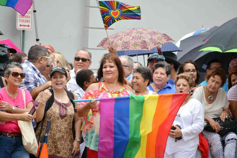 A crowd gathers for a massive same-sex wedding in San Juan, Puerto Rico, Aug. 16. Sixty-four of the 73 same-sex couples scheduled to take vows attended the event, the day a severe months-long drought broke with heavy rain throughout the island.