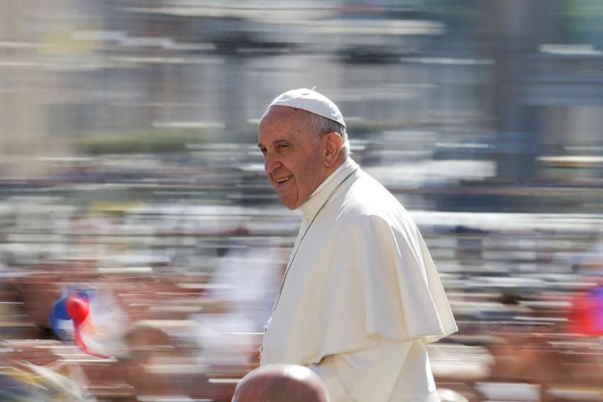 Pope Francis arrives for his general audience in St. Peter&#039;s Square May 17 at the Vatican.