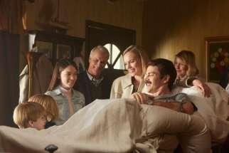 Don Piper (Hayden Christensen) is welcomed home from hospital by his family in the film 90 Minutes in Heaven.