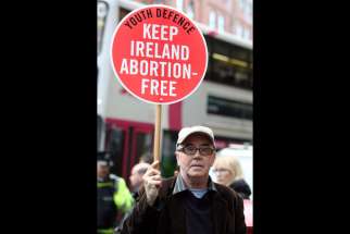 A pro-life supporter demonstrates in 2012 outside the Marie Stopes clinic in Belfast, Northern Ireland. The Catholic bishops of Northern Ireland have described as &quot;profoundly disquieting&quot; a ruling by the High Court that the region&#039;s ban on abortion in all but very limited circumstances breaches human rights legislation.