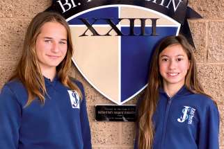 Zofia Pajic, left, and Lexi Bastian, sixth-grade students at St. John XXIII Catholic School in Scottsdale, Ariz., are seen March 10.