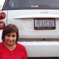Burlington resident Patty McConnell’s current licence plate on her Smart Car reads PEACE4U.