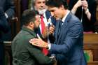 Ukrainian President Volodymyr Zelensky is greeted by Prime Minister Justin Trudeau following his speech in the House of Commons Sept. 22.