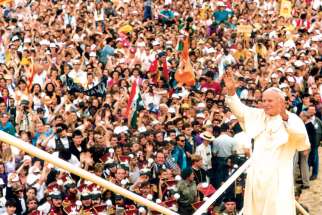 Pope John Paul II greets the World Youth Day crowd in Czestochowa, Poland, in 1992. An estimated 1.5 million people from 80 countries attended the third international World Youth Day.