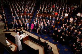 Pope Francis addresses a joint meeting of Congress at the U.S. Capitol in Washington Sept. 24. In the first such speech by a pope, he called on Congress to stop bickering as the world needs help.