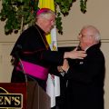 Bishop Douglas Crosby welcomes Fred Miscio to the podium at the Bishop’s Charities Dinner Dance.