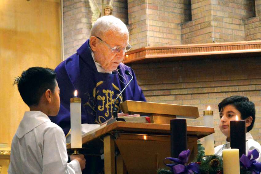 Fr. Ian Boyd, founder of The Chesterton Review, celebrates Mass at St. Andrew’s Church in Edmonton.