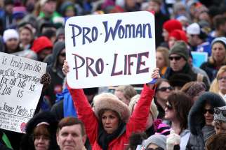 A pro-life advocate holds a sign Jan. 27 during the annual March for Life in Washington D.C.