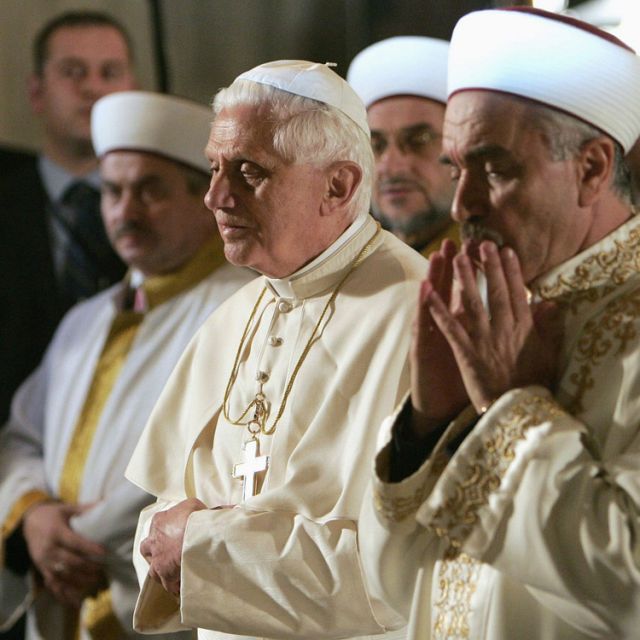 Pope Benedict XVI and Mustafa Cagrici, the grand mufti of Istanbul, pray in the Blue Mosque in Istanbul in this 2006 file photo. In trying to help people understand how belief in God is a natural part of life and provides grounding for the values that pr otect human dignity and peaceful coexistence, Pope Benedict saw Muslims and Jews as natural allies.