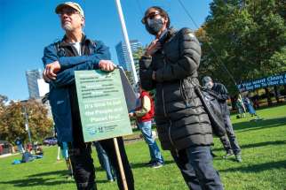 Members of Development and Peace raised their voice against climate change along with 2,000 others at Queen’s Park Nov. 6 for the Global Day of Action.