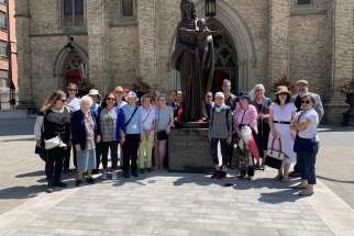 Participants in the first Loretto Sisters’ walking tour gather in front of St. Michael’s Cathedral Basilica.