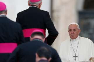  Pope Francis prepares to meet bishops during his general audience in St. Peter&#039;s Square at the Vatican Sept. 19.