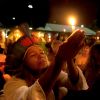 Women take part in a vigil for the environment during the People’s Summit in Rio de Janeiro June 16.