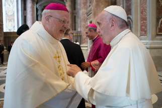 Pope Francis greets Swedish Bishop Anders Arborelius of Stockholm in 2016 at the Vatican. Cardinal-designate Arborelius is one of five new cardinals the pope will create at a June 28 consistory.