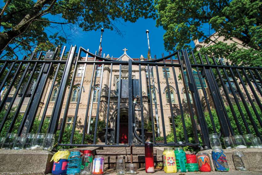 A memorial to the 215 children whose bodies were found in Kamloops stands outside the rectory at St. Michael’s Cathedral Basilica, Toronto.