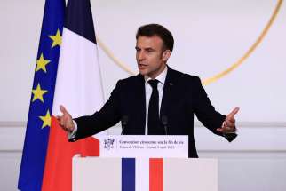 French President Emmanuel Macron attends a conference on the end-of-life, after a panel of citizens worked on the issue in recent months, at the Elysee Palace in Paris, France April 3, 2023.