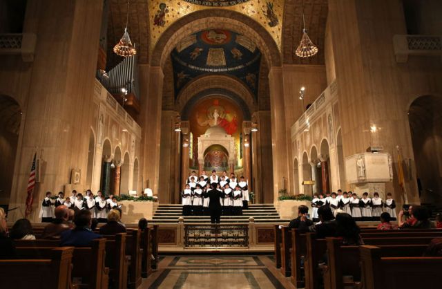 Members of the Escolania de Montserrat, one of the oldest and most venerable boys&#039; choirs in Europe, perform at the Basilica of the National Shrine of the Immaculate Conception in Washington March 15. Founded in the 13th century, the choir sings daily fo r pilgrims at the abbey of Santa Maria de Monserrat in Catalonia, Spain.