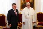 Pope Francis and Jordan&#039;s King Abdullah II pose for photos during a private audience at the Domus Sanctae Marthae guesthouse at the Vatican April 7, 2014. The Jordanian king honoured Scarboro Missions for their interfaith efforts in a ceremony April 20, 2015.