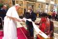 Representatives of the Assembly of First nations present Pope Francis with a beaded leather stole during a meeting with members of three Canadian Indigenous groups in the Vatican’s Clementine Hall April 1. At the meeting the Pope apologized for harms done by members of the Church in Canada’s residential schools.