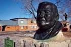 A statue commemorating “Pere Murray” stands on the grounds of Athol Murray College of Notre Dame in Wilcox, Sask.