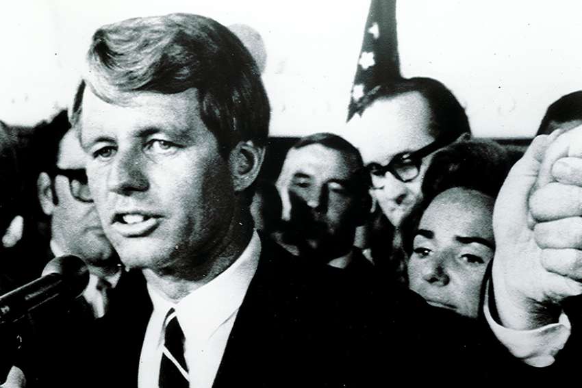 Robert Kennedy, with his wife Ethel in the background, addresses his supporters at the Ambassador Hotel in Los Angeles after winning the California Democratic presidential primary on June 5. Minutes later he was shot.
