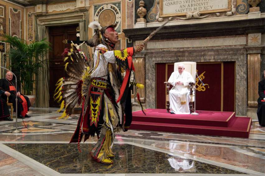 Kevin Scott, a First Nations dancer, performs for Pope Francis in the Vatican&#039;s Clementine Hall April 1, 2022.