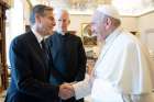 Pope Francis shakes hands with U.S. Secretary of State Antony Blinken during an audience at the Vatican June 28, 2021.