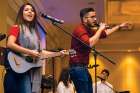 Whitney D’Cunha on guitar and Shaun Fernandes demand a response from Catholic high school students from across the GTA at the Serra Club’s March 5 Ordinandi Youth Event.