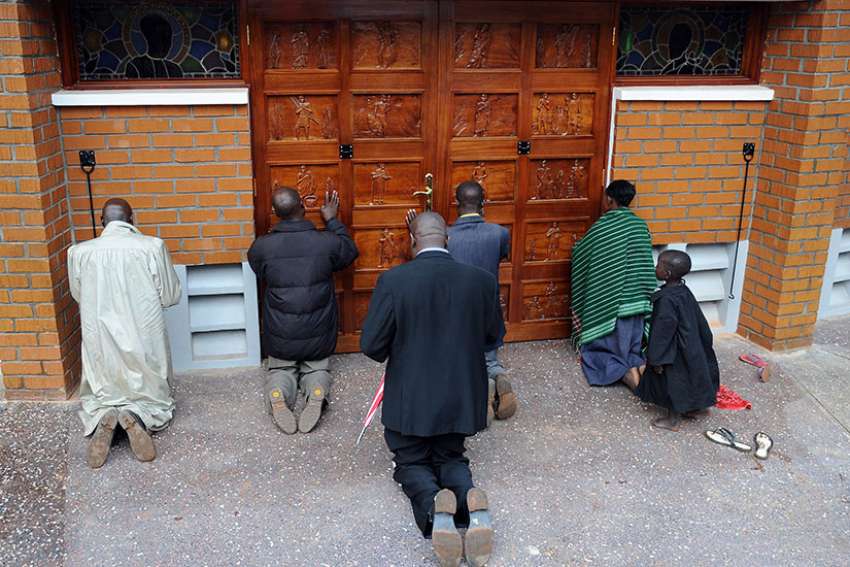 Faithful near Kampala, Uganda, pray at the Uganda Martyrs Shrine, Namugongo in 2015.