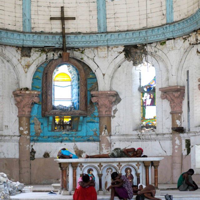 People displaced by the 2010 earthquake sleep inside the damaged St. Ann’s Church in Port-au-Prince, Haiti. A Canadian delegation led by CCCB president Archbishop Richard Smith recently returned from Haiti. Smith said the group saw some  of the fruits of the $20 million raised for Haitian relief by Canadian Catholics.