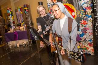 Sr. April Cabaccang added some music to her presentation on vocations to youth at the Pearson Convention Centre on March 7. 