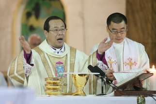 rchbishop Joseph Li Shan of Beijing celebrates Christmas Eve Mass in 2016 at the Cathedral of the Immaculate Conception. 