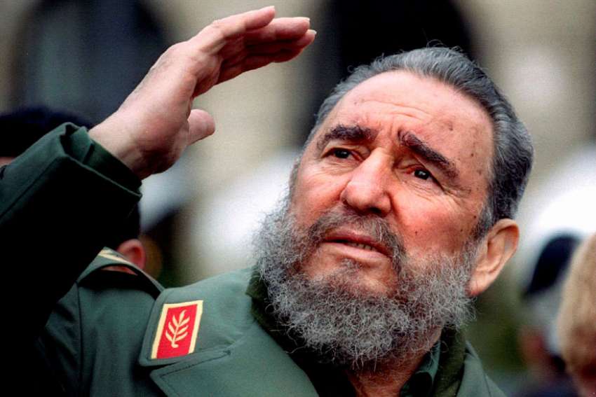 Cuba&#039;s President Fidel Castro gestures during a tour of Paris in this March 15, 1995 file photo. Castro passed away on Nov. 25 at the age of 90.